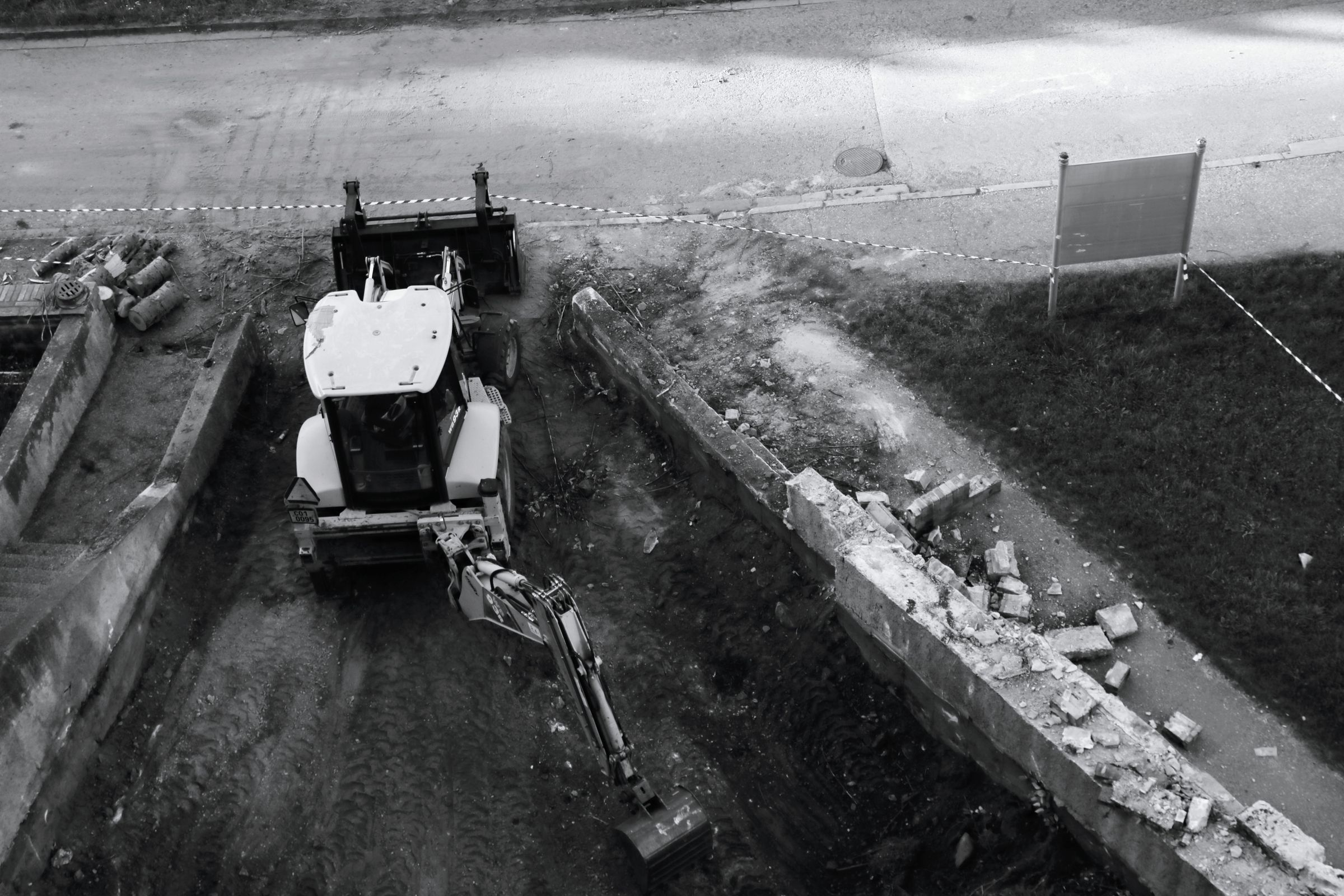 Aerial view of an excavator at a residential construction site